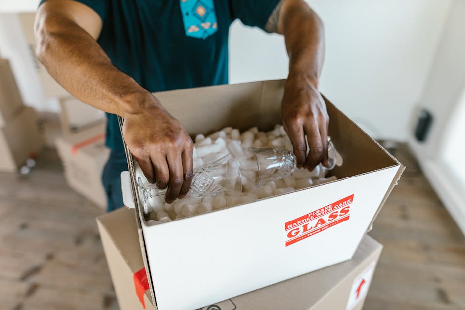 Cardboard moving boxes organized for packing
